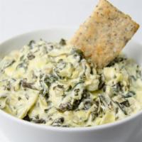 Spinach & Artichoke Dip · Creamy mixture of spinach, artichoke hearts, and cheeses. Served bubbling hot with freshly b...