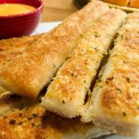 Breadsticks · Fresh out of the oven breadsticks. Served with a house special marinara sauce.