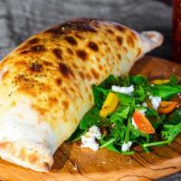 Large Meatball Calzone · Folded pie made with fresh dough, and stuffed with a blend of cheeses, meatballs, herbed ric...