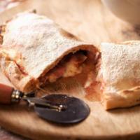Large Italian Calzone · Folded pie made with fresh dough, and stuffed with a blend of cheeses, pepperoni, sautéed on...