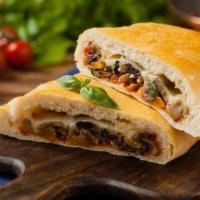 Large Sausage, Mushroom And Cheese Calzone · Folded pie made with fresh dough, and stuffed with a blend of cheeses, sweet Italian sausage...