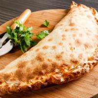 Large Shrimp Florentine Calzone · Folded pie made with fresh dough, and stuffed with a blend of cheeses, spinach, artichoke he...