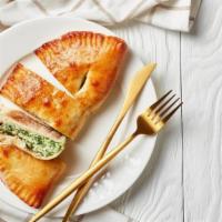Large Spinach And Artichoke Calzone · Folded pie made with fresh dough, and stuffed with a blend of cheeses, spinach and artichoke...