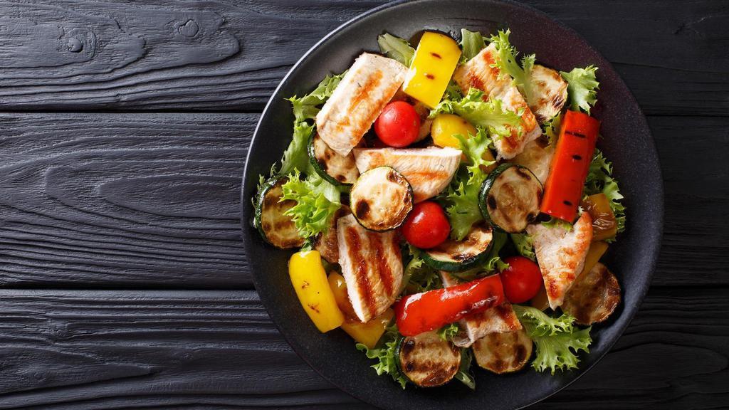 Large Grilled Chicken Salad · Marinated roasted chicken breast and mozzarella served on a garden-fresh mixture of grape tomato, red onions, green bell peppers, fresh sliced mushrooms, and crisp romaine lettuce. Served with a honey mustard dressing along with customer's choice of bread.