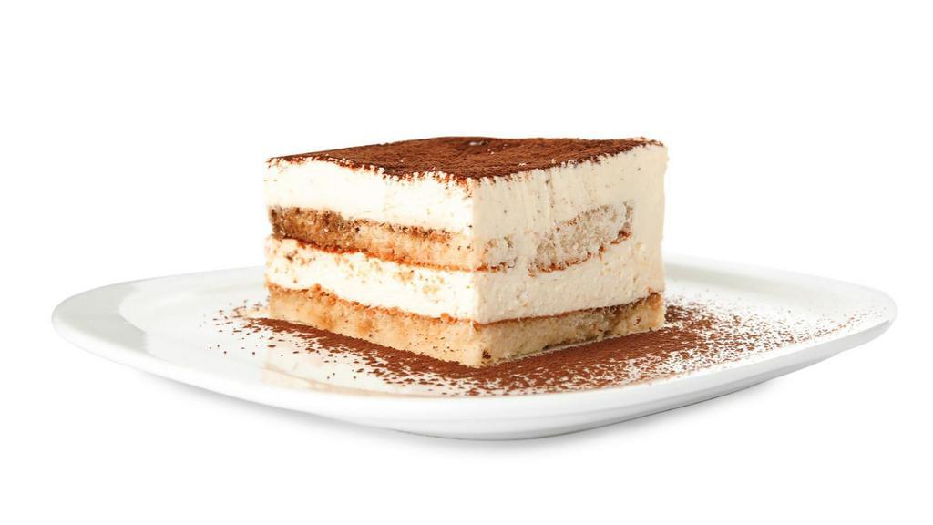 Tiramisu · Clouds of light mascarpone cream on pillows of coffee, rum-soaked lady fingers and finished with powdered sugar.