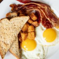 Canal Street Sunrise · 2 eggs cooked your way, served with multigrain toast and your choice of applewood smoked bac...