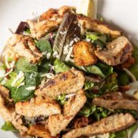 Grilled Chicken Salad · Mixed greens topped with blackened or grilled chicken, bacon, egg, shredded colby cheese, cr...