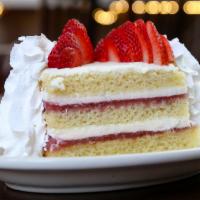 Strawberry Shortcake · Three scrumptious layers of shortcake and strawberry preserves decorated with dairy fresh wh...