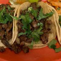 Mexican Tacos · Meat, cilantro, onion and lime.