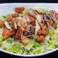 Chicken Caesar Salad · Grilled chicken, hearts of romaine, croutons and Parmesan cheese tossed in a caesar dressing.