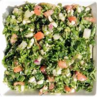 Side Tabbouli · Finely chopped parsley, cracked wheat, tomato, onion, mixed with lemon juice and EVOO.