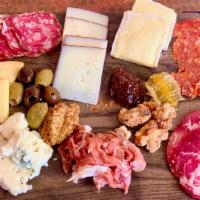 Cheese & Charcuterie - Large · Chef’s choice of artisanal cheeses and meats, served with crostini, fig preserve, candied nu...