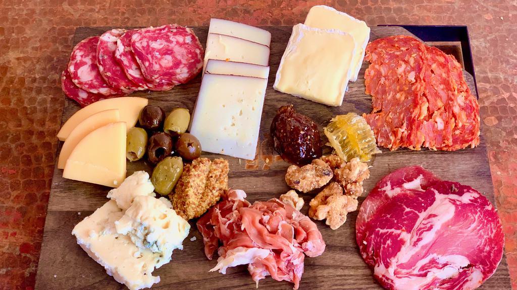 Cheese & Charcuterie - Small  · Chef’s choice of artisanal cheeses and meats, served with crostini, fig preserve, candied nuts, honeycomb and olives.