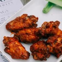 Wings · Served with celery, buttermilk dressing, beer brined and tossed in Goodwood infused hot sauc...