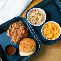 Pulled Pork Bbq Plate · Served with a bun and two sides.