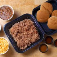 1 1/2 Lbs. Pork · Served with four buns, BBQ sauce, and three large sides.