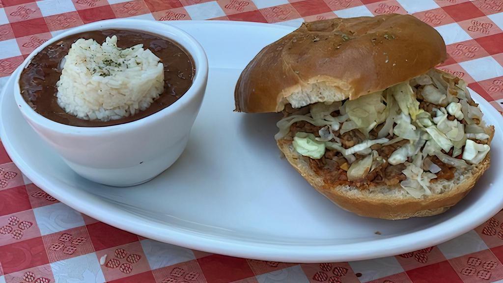 Pulled Pork · Slow cooked pork loin, tossed in a homemade sweet & spicy b. B. Q. Sauce, topped with coleslaw and whiskey dill kraut. Served on a fresh cut bun with a garlic aioli and horseradish spread.