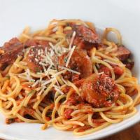 Chicken And Sausage Spaghetti · Classic homemade sauce, simmered in garlic, onion, and bell pepper. Made with boneless chick...