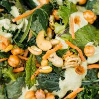 Nashville Hot Kale Salad · Regular. Chopped kale tossed with diced cucumber and our signature “dragon” pumpkin seed sau...