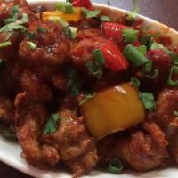 Chili Chicken · Fried chicken, onion, and bell pepper tossed with sauce.