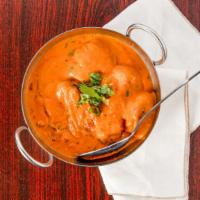 Chicken Tikka Masala · White chicken meat cooked in tomato based creamy sauce.