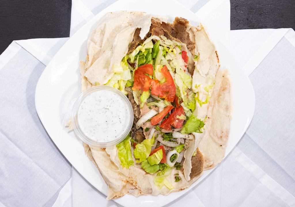 Gyro · A mix of ground beef and ground  lamb meat blended with secret seasonings, topped with tzatziki .