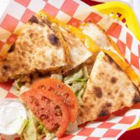 Chicken Quesadilla · mixed cheese, chicken, lettuce, tomatoes & sour cream on the side.