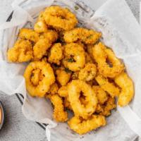 Fried Calamari · Lightly battered rings fried to a golden brown and make ya feel fancy. Your choice of sauce.