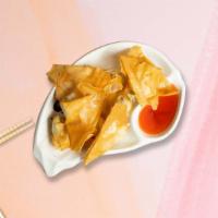 The Crab Rangoon Lagoon · Golden fried wontons stuffed with cream cheese and crab meat. Served with sweet and sour sau...