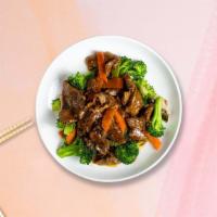 The Green Beef · Sauteed flank steak with American broccoli in brown sauce.