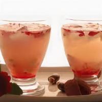 Lychee Rose · Lychee grenn tea topped with fresh rose syrup.
