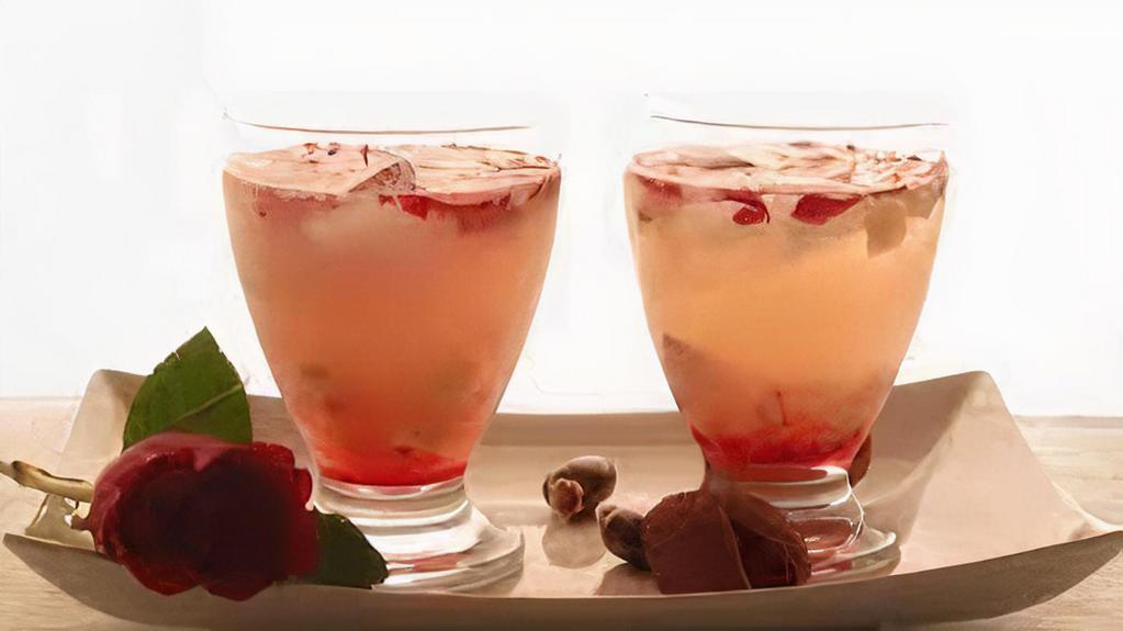 Lychee Rose · Lychee grenn tea topped with fresh rose syrup.