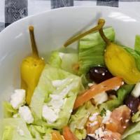 Small Garden Salad · Lettuce, tomatoes, cucumbers, black and green olives, onions, and banana peppers. Comes with...