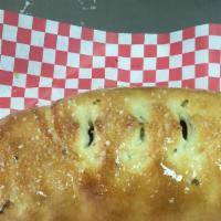 Specialty Stromboli · Your choice of style. Comes with marinara on the side.