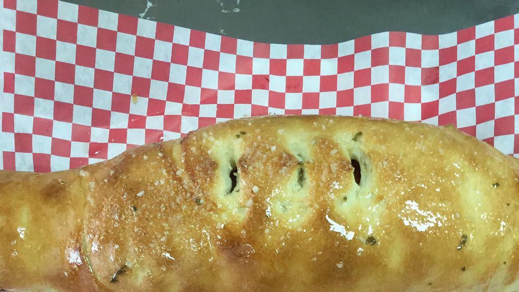 Specialty Stromboli · Your choice of style. Comes with marinara on the side.