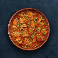 Chicken Tikka Masala · Oven-roasted chicken chunks in a rich creamy tomato and onion based gravy.