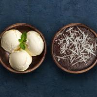 Chocolate Lava With Ice Cream · Warm cake loaded with molten chocolate and topped with a scoop of enticing ice cream.