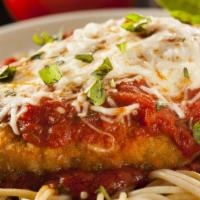 Chicken Parmesan · Delicious parmesan chicken over spaghetti with fresh marinara sauce and mozzarella with fres...