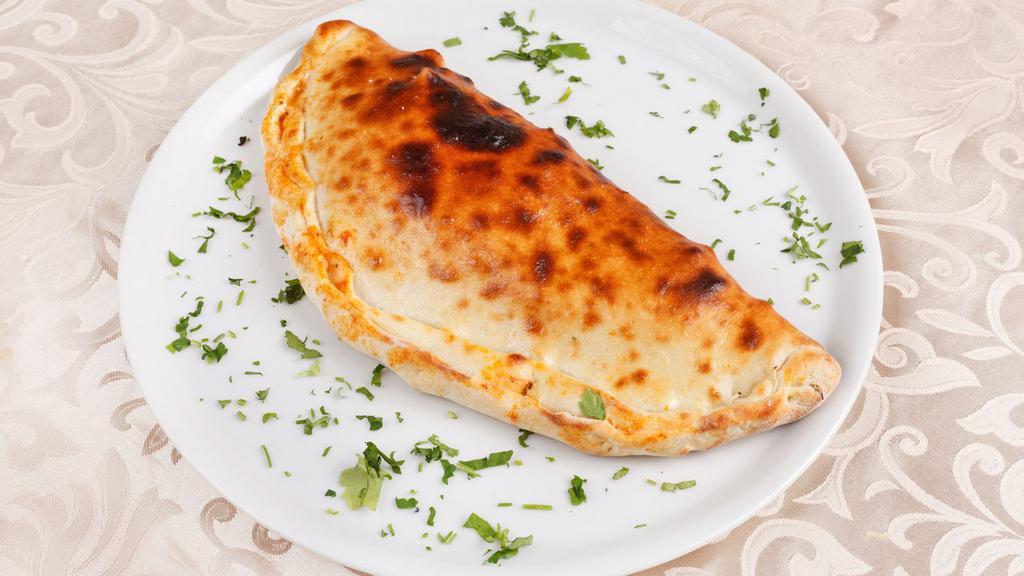 Supreme Calzone · Juicy pepperoni, sausage, bell pepper, onions, mushrooms, and mozzarella.