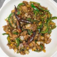 Farmer’S Beef · Sliced beef with spicy dry rub stir fried with three types of chilies.