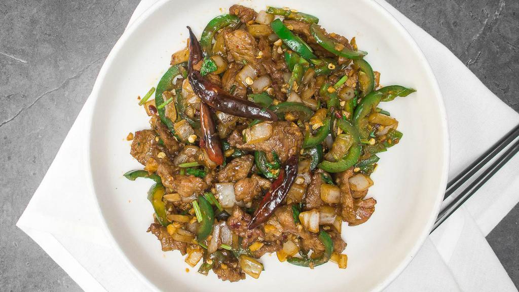 Farmer'S Beef · Spicy. Sliced beef with spicy dry rub stir-fried with three types of chilies and cilantro.