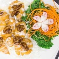 Honey Walnut Shrimp · Crispy shrimp tossed in honey cream sauce topped with candied walnuts.