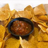 Simple Chips & Salsa · House made salsa and chips.