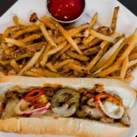 Chicken Philly Cheesesteak · Our chicken is hand sliced daily. Cheesesteaks are served on a traditional Amoroso roll, and...