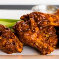 4 Bone-In Wings · Our wings are served with Ranch or Blue Cheese dressing, celery and either our<br />house ma...