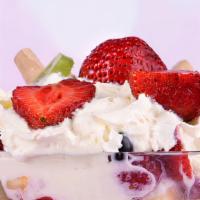 Fruits With Ice Cream · Apple, strawberry, banana, and kiwi mixed with ice cream.