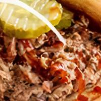 Pulled Pork Sandwich · Hand pulled smoked pork that is just what you were hoping it would be!