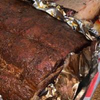 Half Or Full Rack Of Ribs Dinner · Dry rubbed and smoked for hours.  You'll love these ribs! They are perfect!