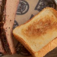 Brisket Dinner · Sliced brisket smoked for 14 hours! Maybe our best dish!