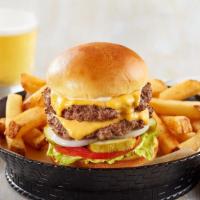 The Classic Double Stack · Not one -but two- juicy burgers layered with melted american cheese with lettuce, tomato, on...